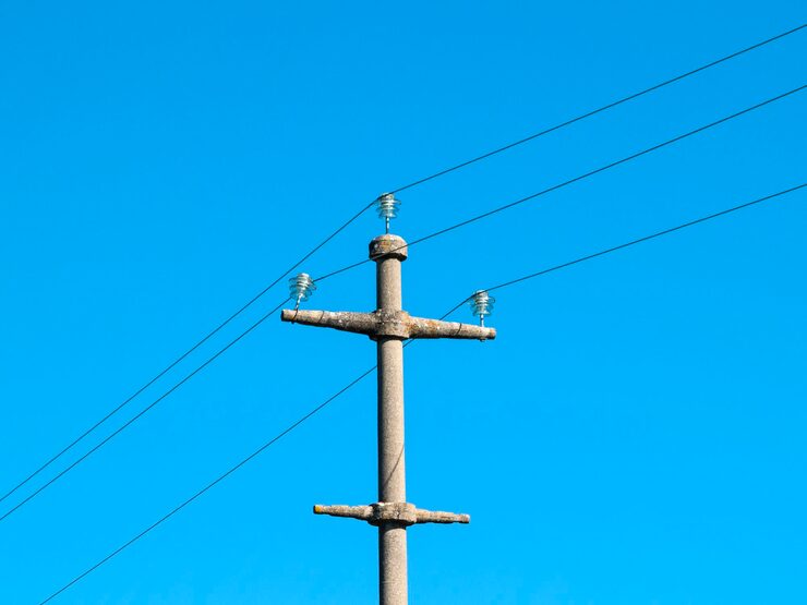 low-angle-view-electricity-pylon-against-clear-blue-sky_1048944-30881015